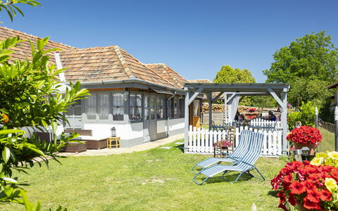Sunny: Roof, House, Residential Area, Home, Cottage, Shrub, Porch, Land Lot, Shade