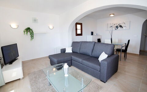 Amare Monte: Couch, Furniture, Property, Interior Design, Lighting, Living Room, House, Floor, Flooring, Comfort