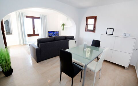 Amare Monte: Plant, Table, Couch, Furniture, Property, Building, Chair, Window, Houseplant, Interior Design