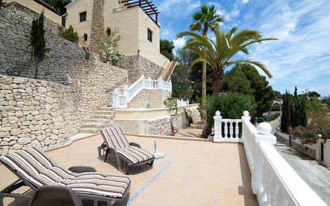 Amare Monte: Cloud, Sky, Plant, Building, Azure, Tree, Outdoor Furniture, Urban Design, House, Arecales