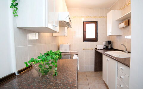 Amare Monte: Cabinetry, Property, Furniture, Plant, Countertop, Building, Wood, Interior Design, Lighting, Houseplant
