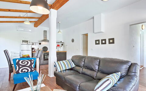 Ravan: Couch, Furniture, Property, Picture Frame, Comfort, Interior Design, Living Room, Lighting, Flooring, Pillow