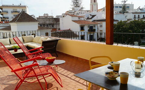 Plaza de Las Flores: Table, Furniture, Property, Building, Flowerpot, Sky, Chair, Outdoor Table, Interior Design, Outdoor Furniture