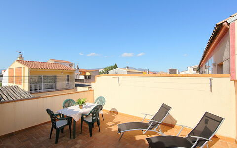 Puigmal: Sky, Building, Property, Window, Table, Shade, Outdoor Furniture, Chair, Interior Design, Wood