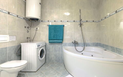 Villa Vittoria: Bathtub, Plumbing Fixture, Property, Bathroom, Shower Head, Tap, Building, Purple, Shower, House