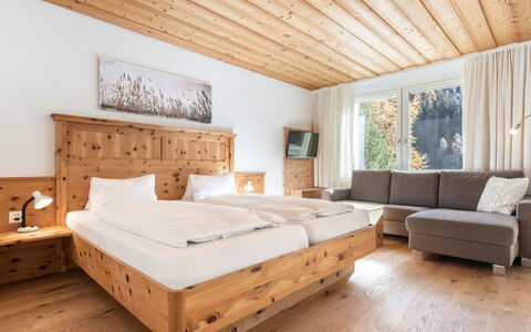 Atlantis Apartments by Mein Samnaun – Mo: Wood, Interior Design, Furniture, Ceiling, Hardwood, Bed, Wood Stain, Bedroom, Wood Flooring, Plank