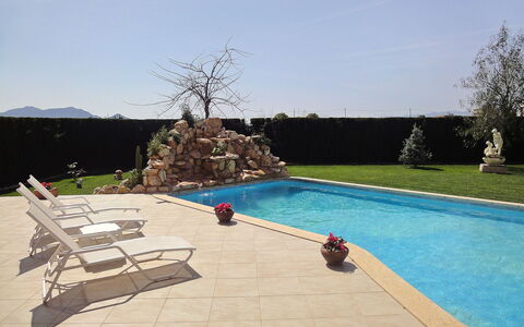 L'Aldea: Swimming Pool, Property, Leisure, Wall, Backyard, Vacation, House, Summer, Real Estate, Tree