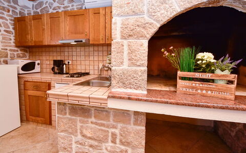 Josipa: Countertop, Property, Plant, Cabinetry, Building, Flower, Wood, Flowerpot, Kitchen, Interior Design