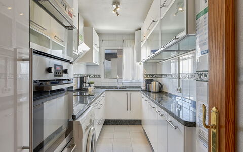 Estepona 108: Cabinetry, Countertop, Furniture, Kitchen, Kitchen Appliance, Window, Home Appliance, Kitchen Stove, Building, Shelf
