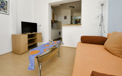 Josip 102.1: Property, Furniture, Couch, Comfort, Table, Wood, Interior Design, Floor, Picture Frame, Living Room