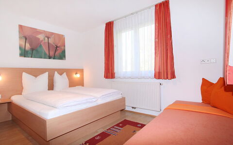 Schaller: Furniture, Comfort, Bed Frame, Wood, Building, Orange, Textile, Interior Design, Window, Shade