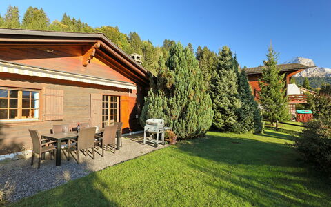 Chalet Lorila: Sky, Plant, Property, Building, Tree, Natural Landscape, Window, Land Lot, Grass, Leisure