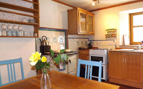 Tarskavaig: Furniture, Table, Cabinetry, Property, Flower, Ceiling Fan, Countertop, Window, Interior Design, Lighting