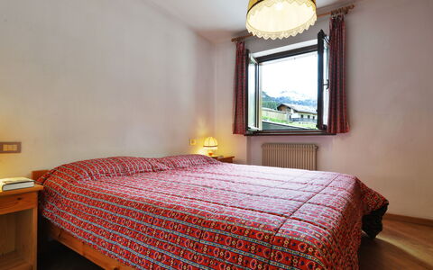 Canazei 570: Building, Furniture, Window, Comfort, Wood, House, Lighting, Interior Design, Bed, Bed Frame