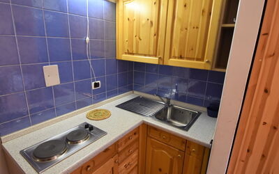 Apt 8 590.2: Countertop, Cabinetry, Sink, Property, Tap, Kitchen Sink, Building, Kitchen, Wood, Interior Design