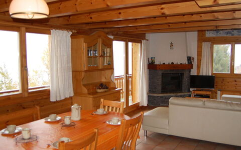Chalet Boucaro: Furniture, Table, Property, Window, Wood, Tableware, Interior Design, Chair, Architecture, Couch