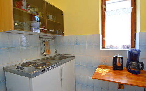 Zaton (Šibenik) 102: Kitchen Sink, Kitchen Stove, Kitchen Appliance, Cooktop, Kitchen, Cabinetry, Gas Stove, Countertop, Stove, Interior Design