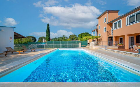 Ulika: Water, Cloud, Sky, Plant, Swimming Pool, Window, Azure, Blue, Building