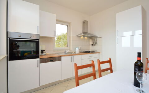 Mira: Cabinetry, Property, Countertop, Furniture, Kitchen Appliance, Bottle, Kitchen Stove, Table, Home Appliance, Kitchen