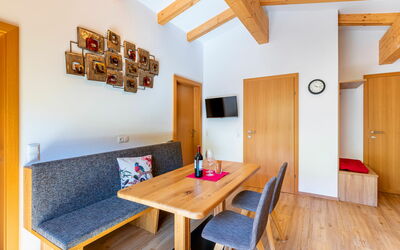 Mooslehen 720.2: Table, Building, Furniture, Property, Wood, Interior Design, Couch, Orange, House, Living Room