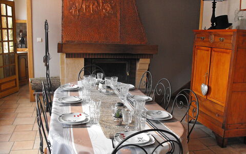 La Ferme de Gabrielle: Table, Furniture, Tableware, Chair, Dishware, Building, Kitchen & Dining Room Table, Tablecloth, Interior Design, Cabinetry