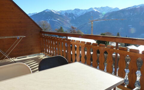 Ardévine 5: Sky, Property, Furniture, Mountain, Table, Wood, Outdoor Furniture, Building, Fence, House
