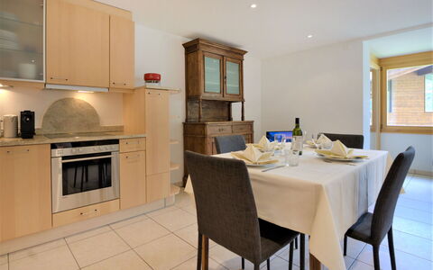 La Prairie: Furniture, Cabinetry, Property, Table, Countertop, Chair, Kitchen Stove, Building, Wood, Kitchen Appliance