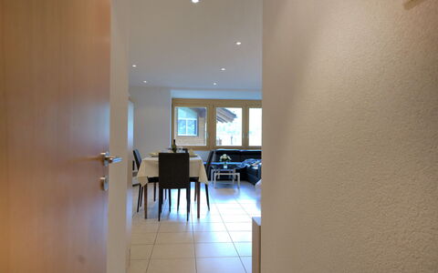 La Prairie: Wood, Floor, Hall, Table, Chair, Flooring, Shade, Building
