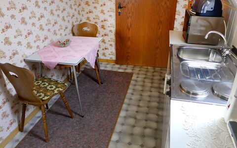 Büscher: Furniture, Property, Countertop, Table, Kitchen Appliance, Wood, Interior Design, Cabinetry, Flooring, Building
