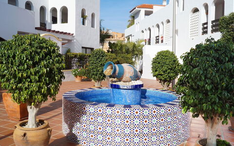La Maestranza: Property, Blue, Building, Real Estate, Town, Azure, House, Tree, Courtyard, Architecture