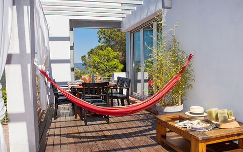 Ginesteres: Plant, Building, Wood, Outdoor Furniture, Tree, Flooring, Floor, Table, Living Room, Hardwood
