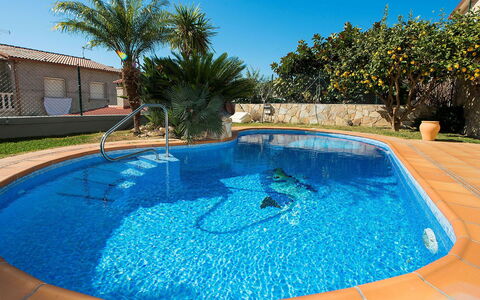 Juan: Swimming Pool, Property, Leisure, Real Estate, Water, Vacation, Backyard, House, Tree, Resort Town