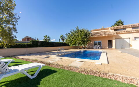 Alex: Sky, Plant, Water, Building, Swimming Pool, Tree, Shade, Grass, Land Lot, Landscape