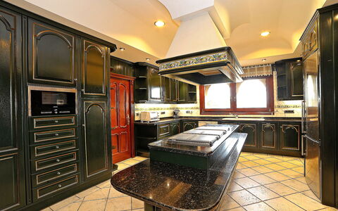 St Anthony: Cabinetry, Furniture, Countertop, Property, Kitchen, Kitchen Appliance, Wood, Home Appliance, Lighting, Kitchen Stove