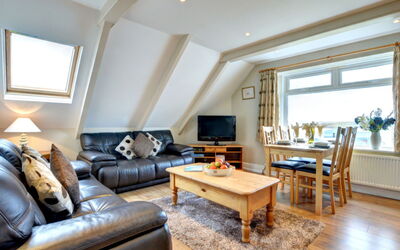 Pentyre House 628.1: Furniture, Couch, Property, Table, Picture Frame, Building, Comfort, Wood, Living Room, Plant