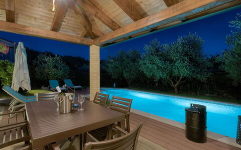 Marina: Table, Furniture, Property, Swimming Pool, Chair, Outdoor Furniture, Lighting, Shade, Interior Design, Water
