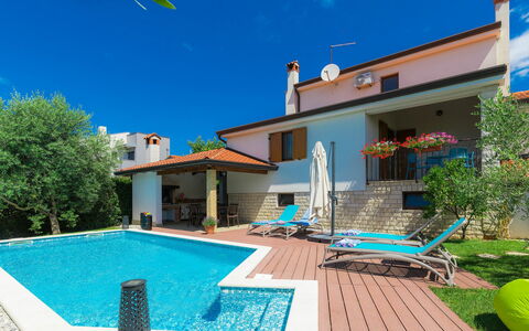 Marina: Building, Sky, Property, Furniture, Green, Plant, Water, Azure, Nature, Blue