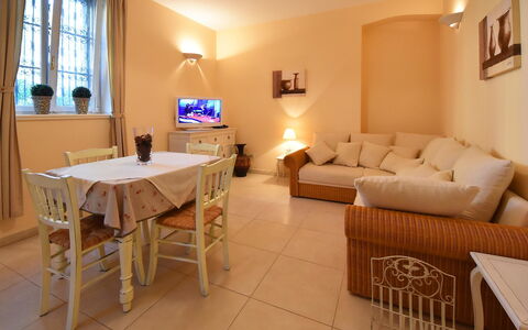 Opatija 134: Table, Furniture, Property, Couch, Picture Frame, Wood, Textile, Interior Design, Window, Lighting
