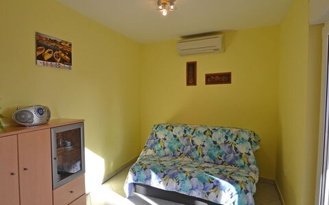 Lidija: Furniture, Property, Cabinetry, Azure, Comfort, Wood, Interior Design, Lighting, Drawer, Pillow