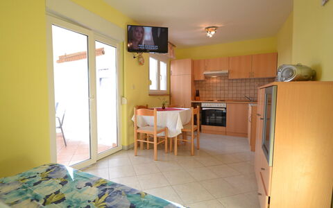 Lidija: Property, Furniture, Chair, Building, Interior Design, Comfort, Wood, Yellow, Floor
