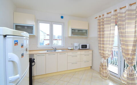 Ena: Cabinetry, Property, Building, Kitchen Sink, Window, Countertop, Tap, Sink, Interior Design, Lighting