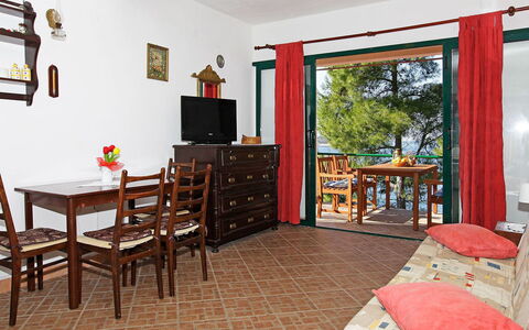 Korčula Prigradica 300: Table, Furniture, Property, Cabinetry, Picture Frame, Wood, Living Room, Lighting, Chair, Drawer