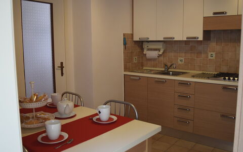 Piazzetta: Building, Table, Property, Cabinetry, Furniture, Kitchen Sink, Sink, Dishware, Tap, Wood