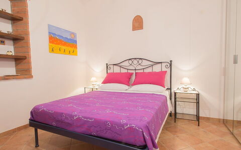 Podere la Quercia: Bedroom, Bed, Furniture, Room, Bed Sheet, Property, Bed Frame, Bedding, Pink, Interior Design