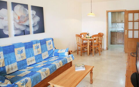 Benidorm 700: Table, Furniture, Couch, Interior Design, Wood, Comfort, Floor, Flooring, Living Room, Building