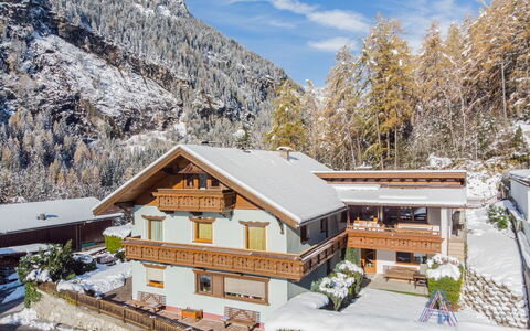 Dialer: Sky, Property, Snow, Building, Cloud, Plant, Window, Mountain, House, Tree