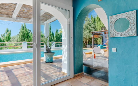 Karima: Blue, Flooring, Interior Design, Floor, Furniture, Ceiling, Resort, Chair, Houseplant, Swimming Pool
