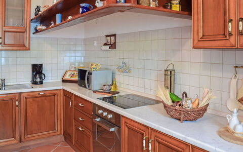 Lea: Countertop, Cabinetry, Kitchen Sink, Sink, Tap, Property, Furniture, Kitchen, Blue, Wood