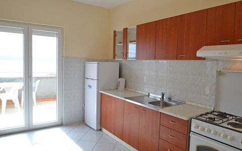 Ante: Cabinetry, Countertop, Property, Building, Sink, Kitchen Stove, Wood, Kitchen, Drawer, Kitchen Appliance