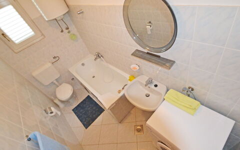 Ante: Property, Plumbing Fixture, Bathroom Sink, Toilet, Toilet Seat, Bathroom, Tap, Wood, Window, Floor